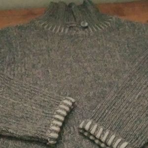 Sweater, large but it would fit an x large easily